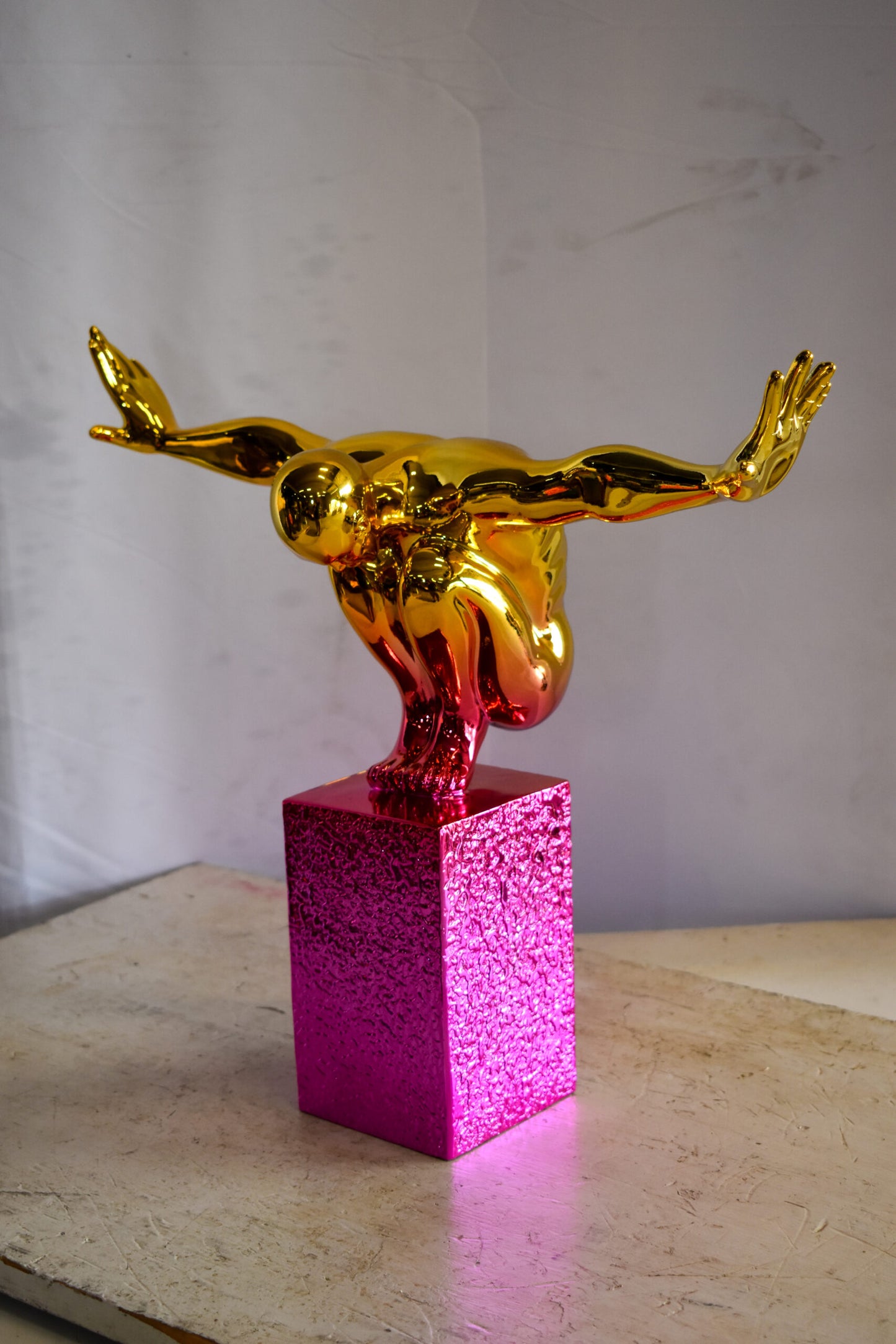 Olympian Stanced Man on Patterned Pink Chrome Base Resin Statue 20" x 8" x 17"H