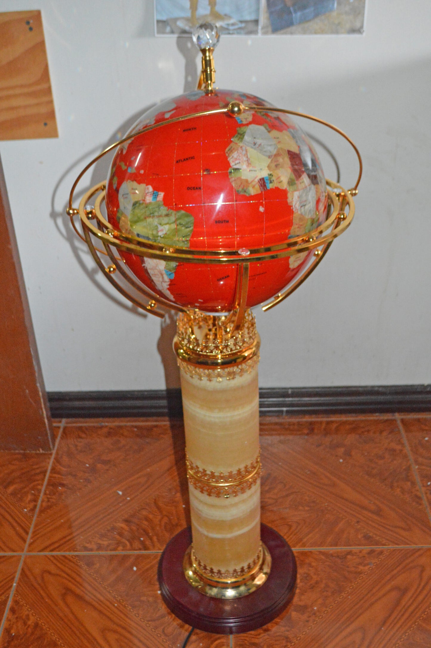 Illuminated Red - World Globe Rotated by a Motor - Size: 19"L x 19"W x 42"H.