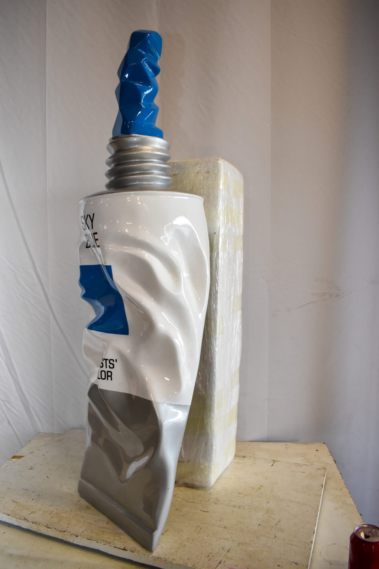Oversized Wall Mounted Sky Blue Paint Tube Squezed Resin Statue 10" x 12" x 44"H