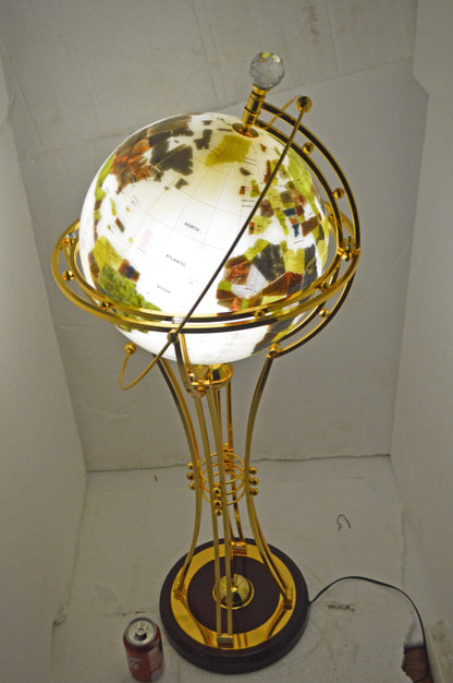 Illuminated White Gold World Globe Rotated by motor - Size: 19"L x 19"W x 42"H.