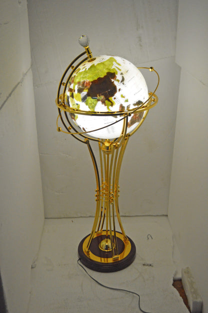 Illuminated White Gold World Globe Rotated by motor - Size: 19"L x 19"W x 42"H.