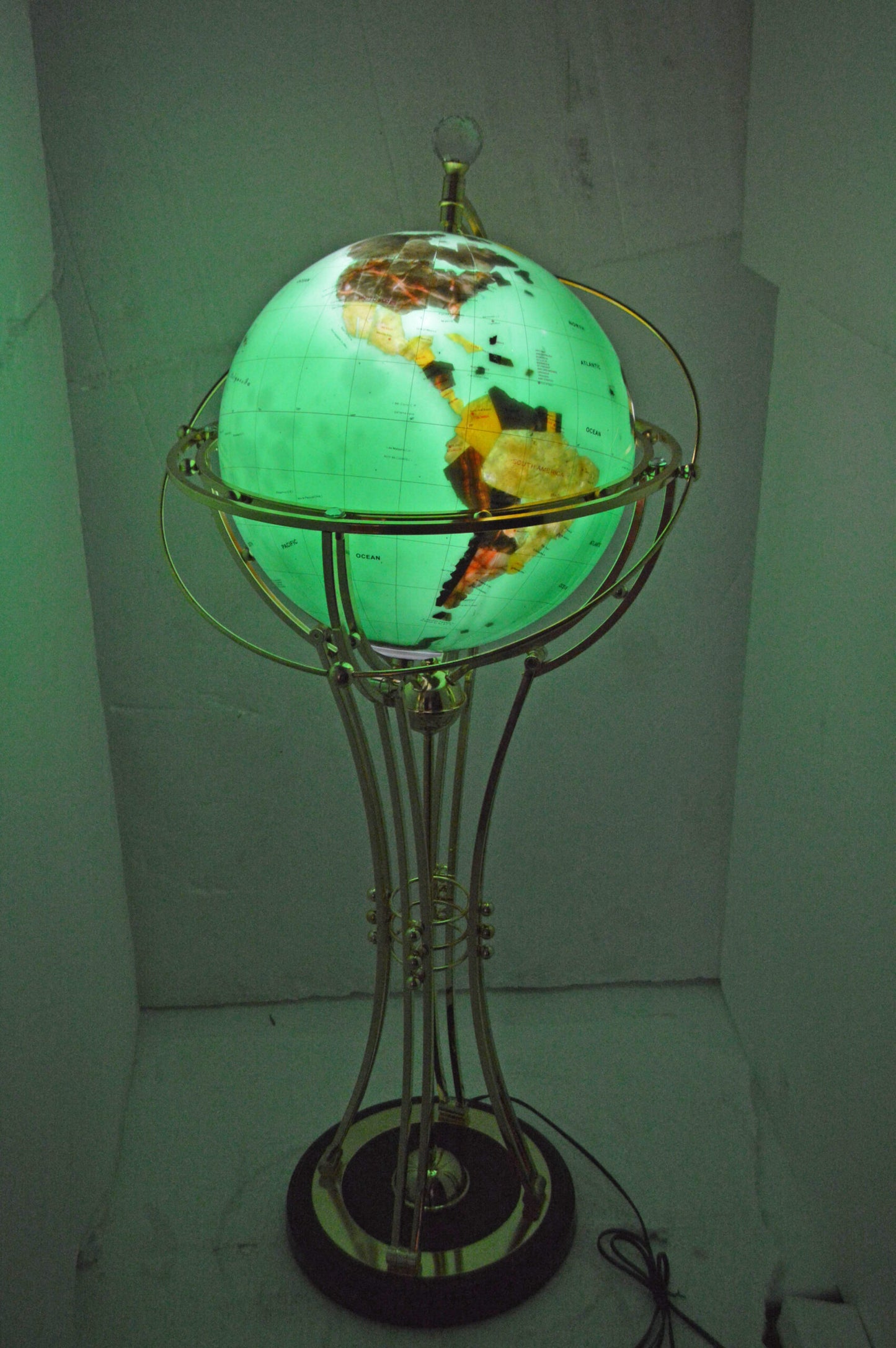 Illuminated Green - Gold World Globe Rotated by a motor - Size: 19" x 19" x 42"H