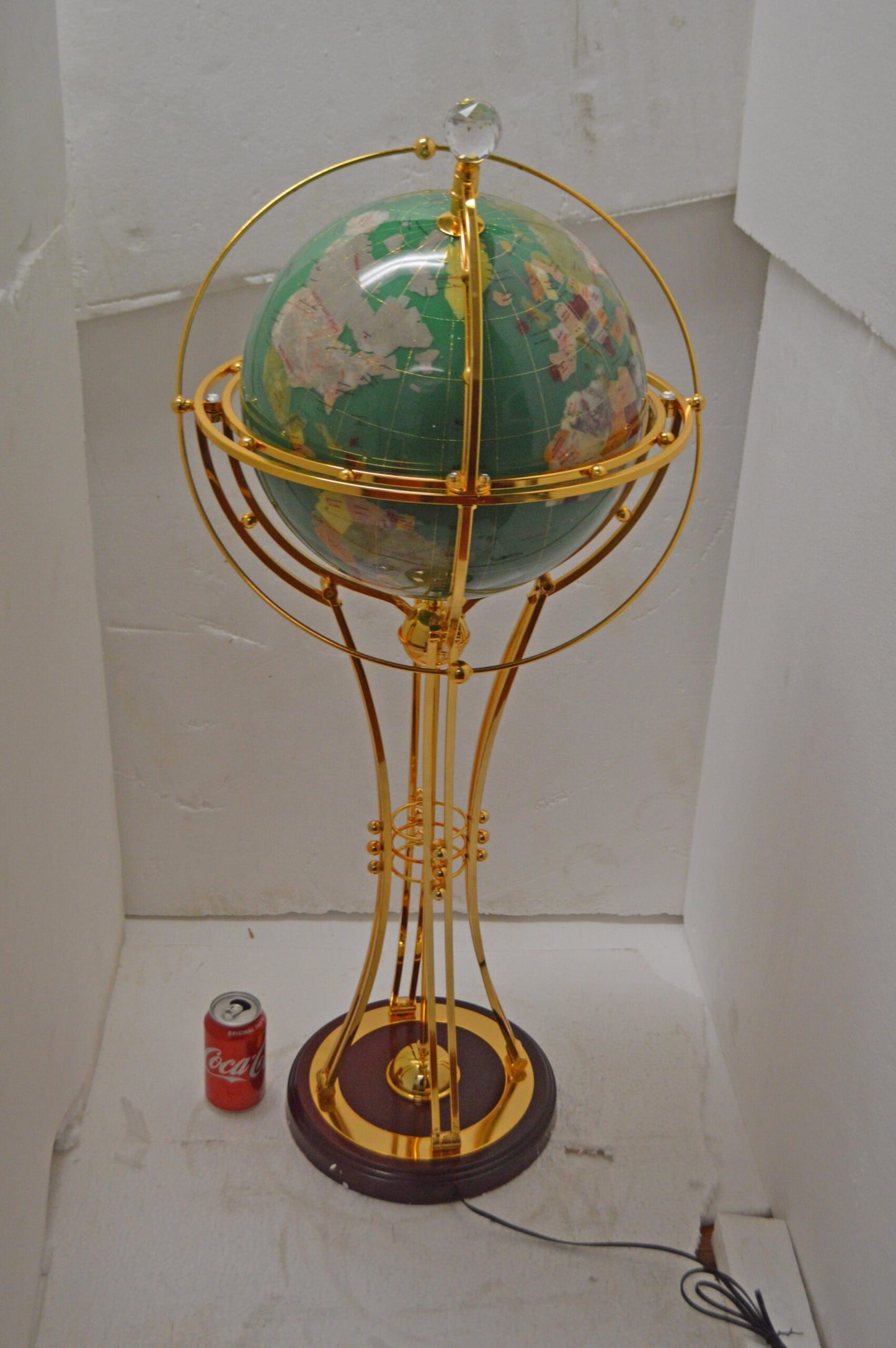 Illuminated Green - Gold World Globe Rotated by a motor - Size: 19" x 19" x 42"H