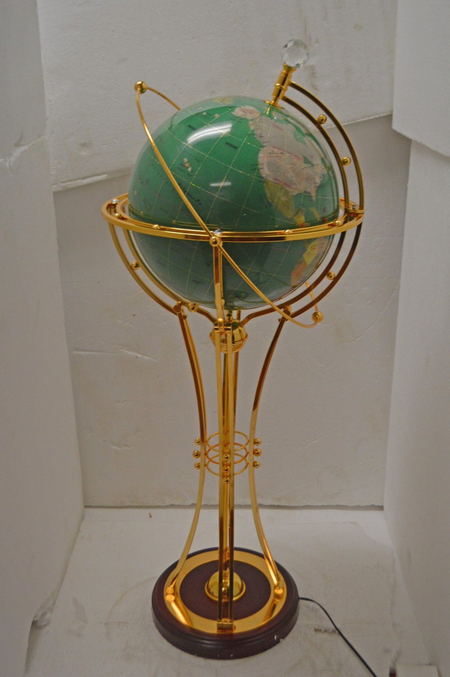 Illuminated Green - Gold World Globe Rotated by a motor - Size: 19" x 19" x 42"H