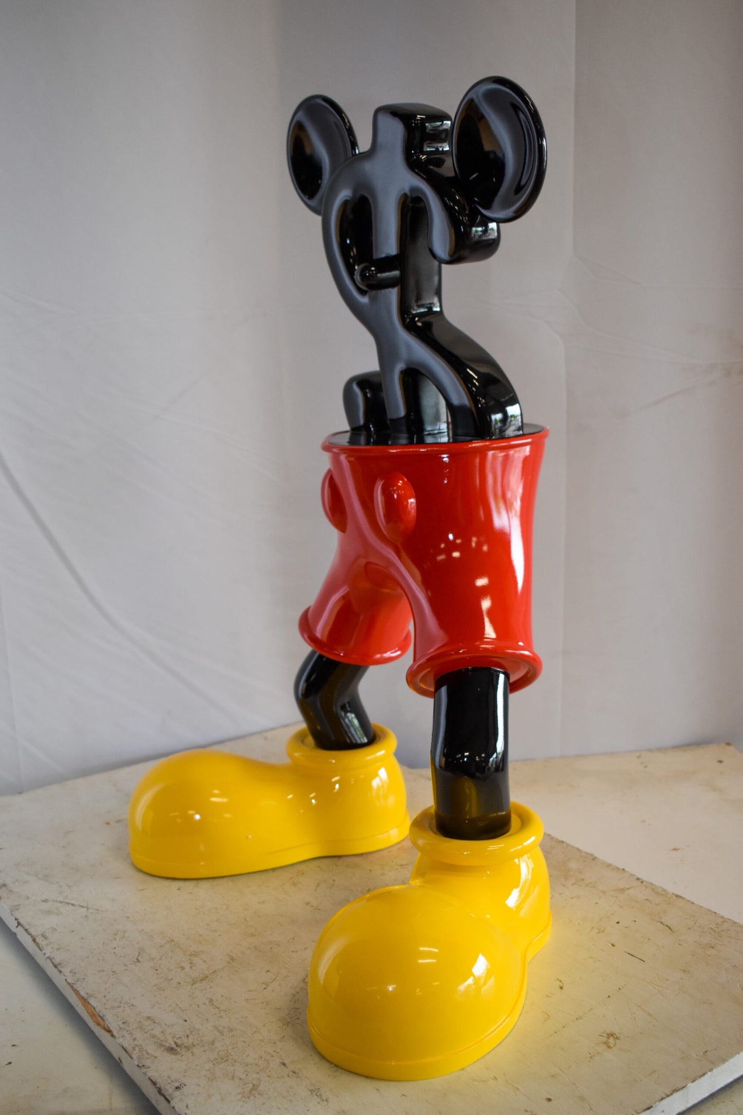 Distinctive and Playful Mickey Themed Dollar Sign Resin Statue 22" x 15" x 29"H