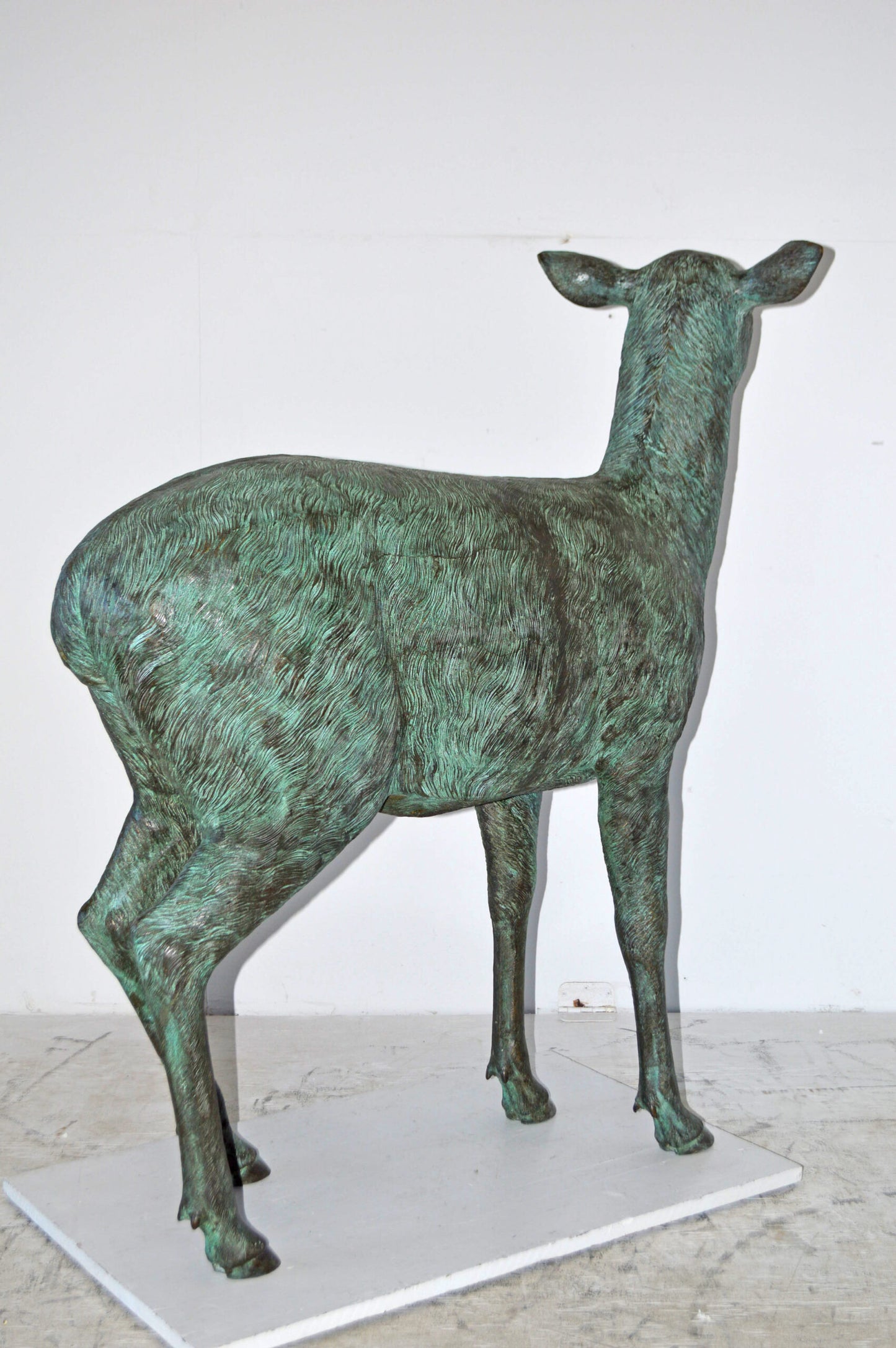 Pair of life size deer bronze statue with Green Patina - Size: 17" x 44" x 52"H.
