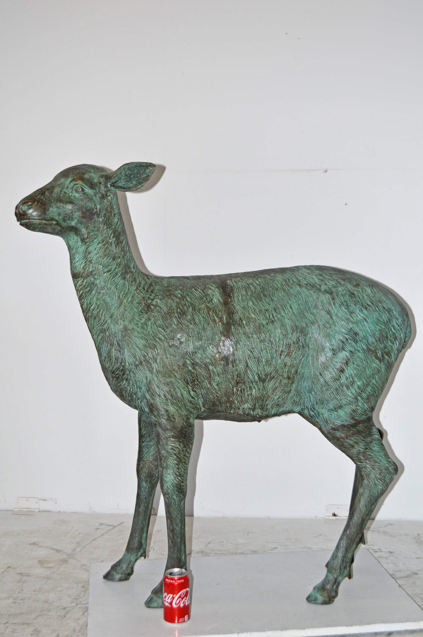 Pair of life size deer bronze statue with Green Patina - Size: 17" x 44" x 52"H.