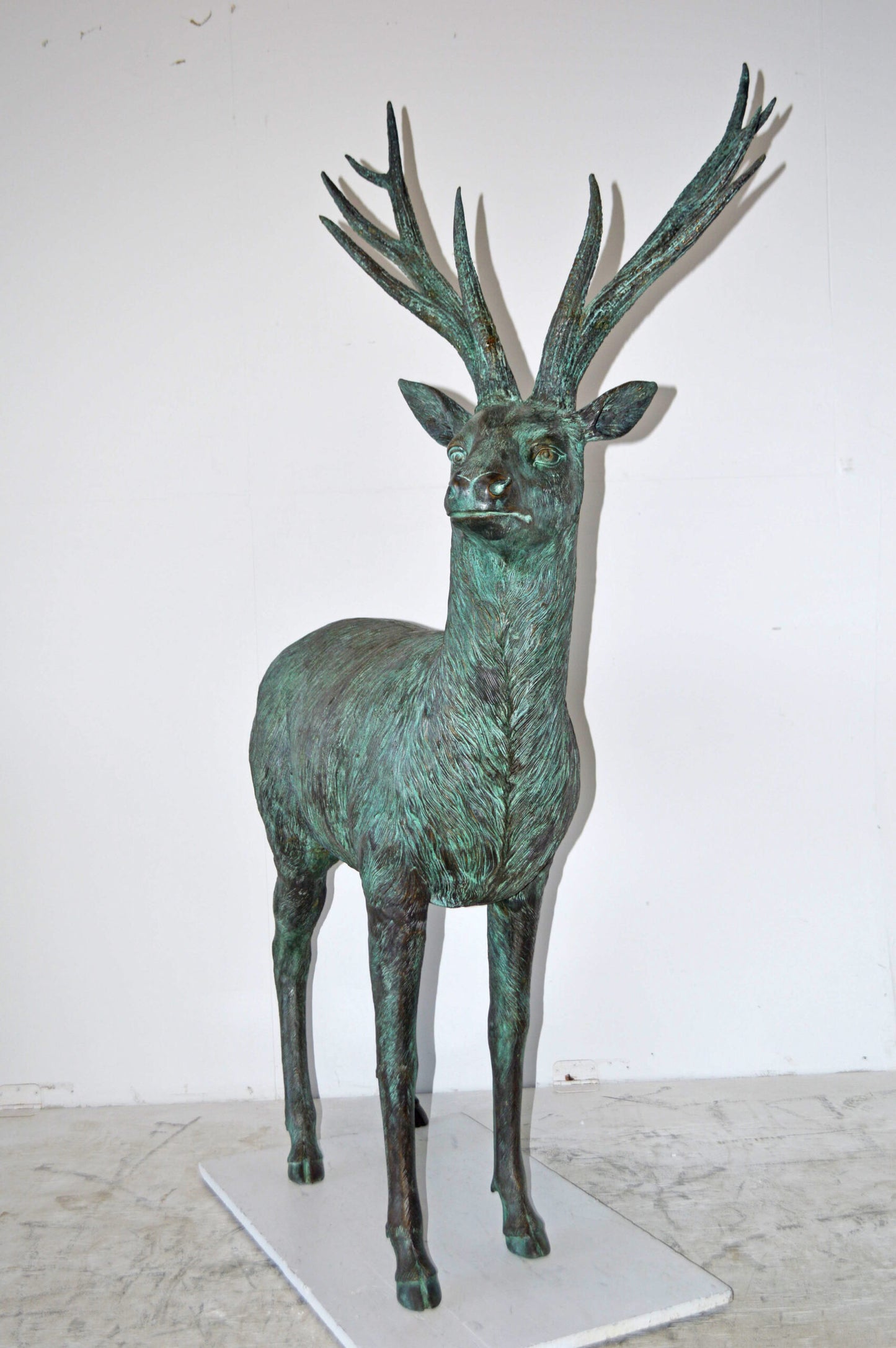 Pair of life size deer bronze statue with Green Patina - Size: 17" x 44" x 52"H.