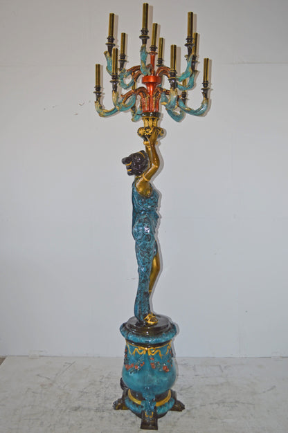 A Pair of Ladies holding a Lamp Bronze Statue - Size: 30"L x 30"W x 100"H.