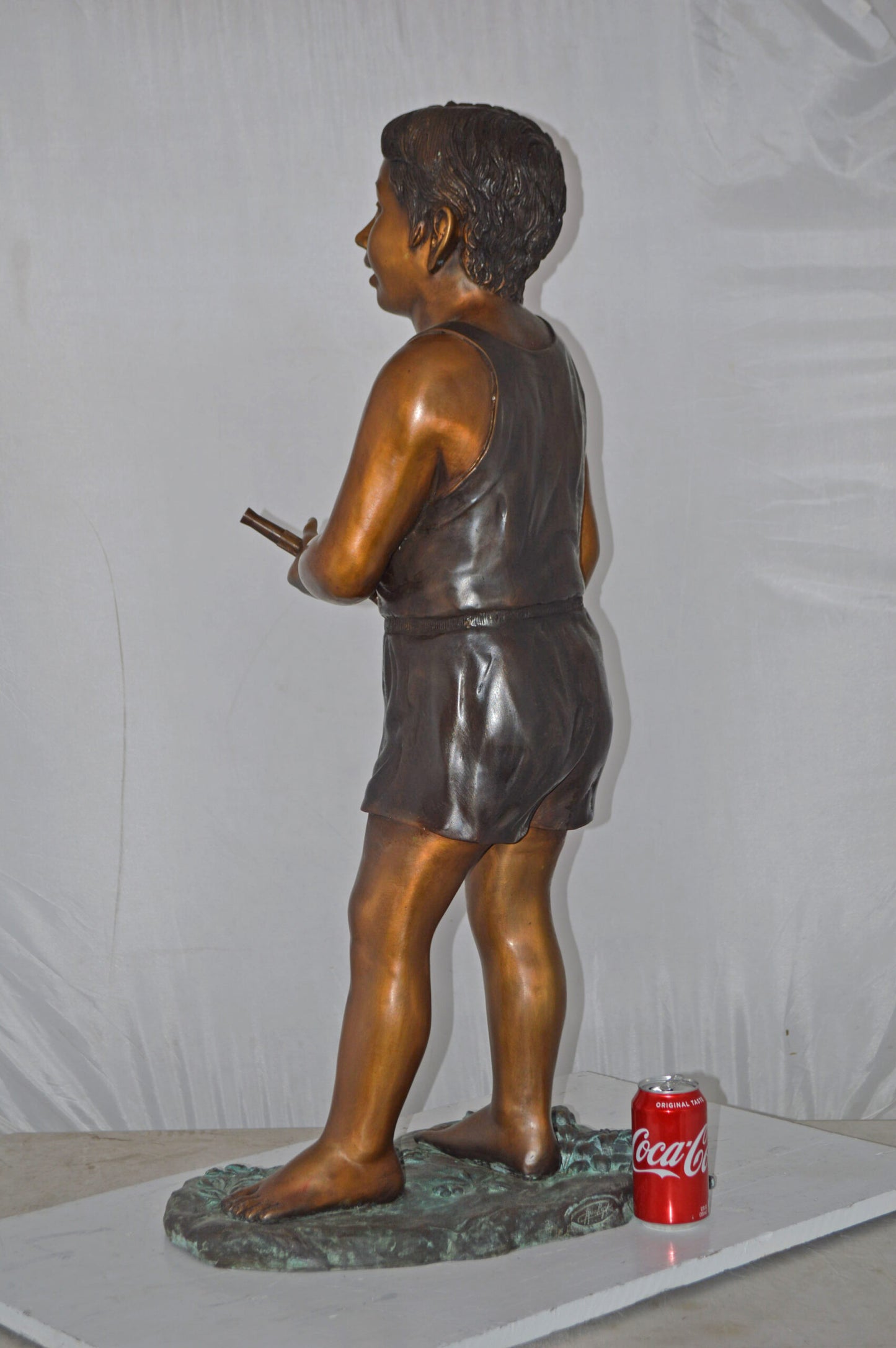 A Boy Holding A Garden Hose Bronze Statue Fountain - Size: 13"L x 20"W x 39"H.