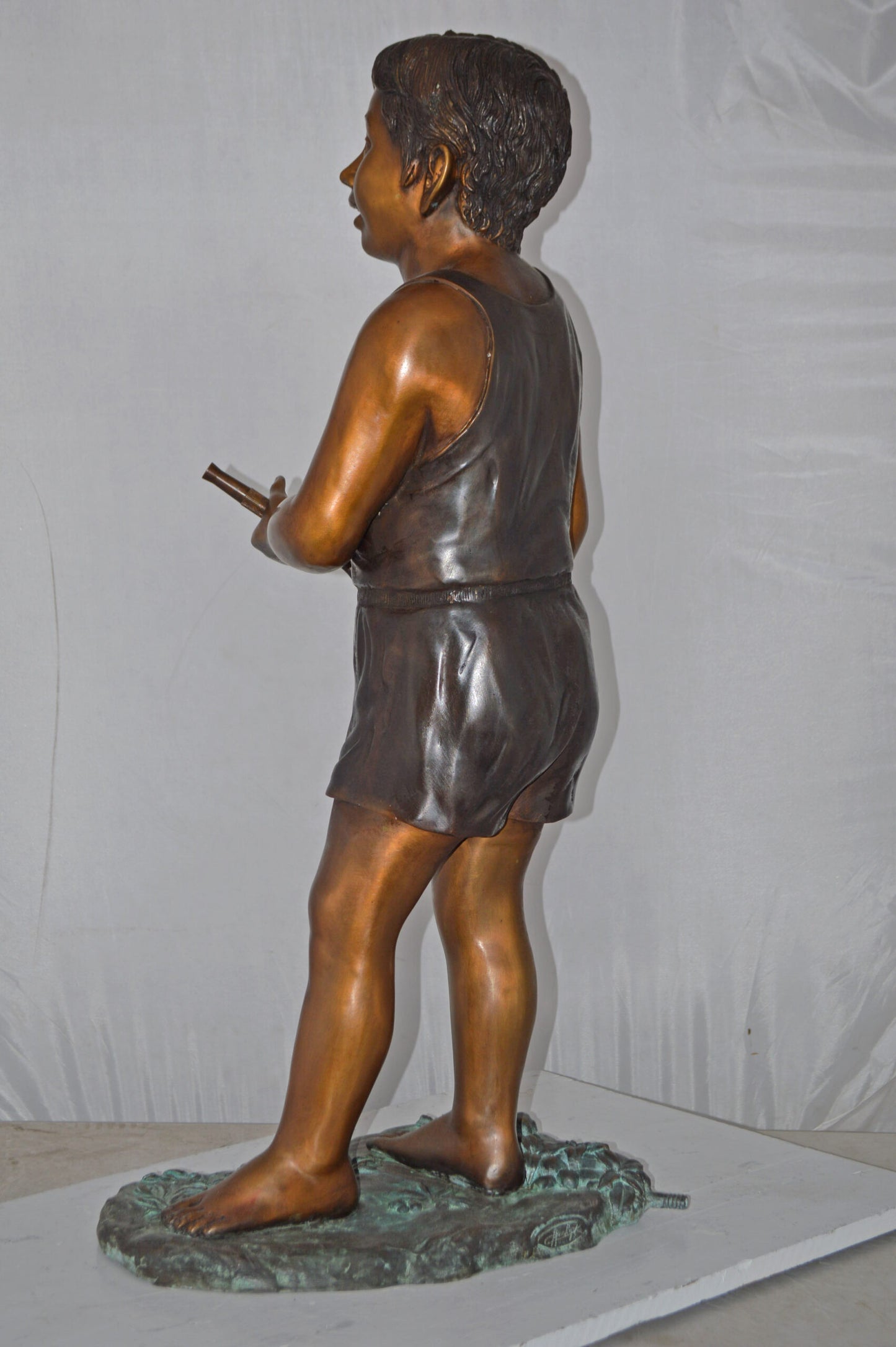 A Boy Holding A Garden Hose Bronze Statue Fountain - Size: 13"L x 20"W x 39"H.