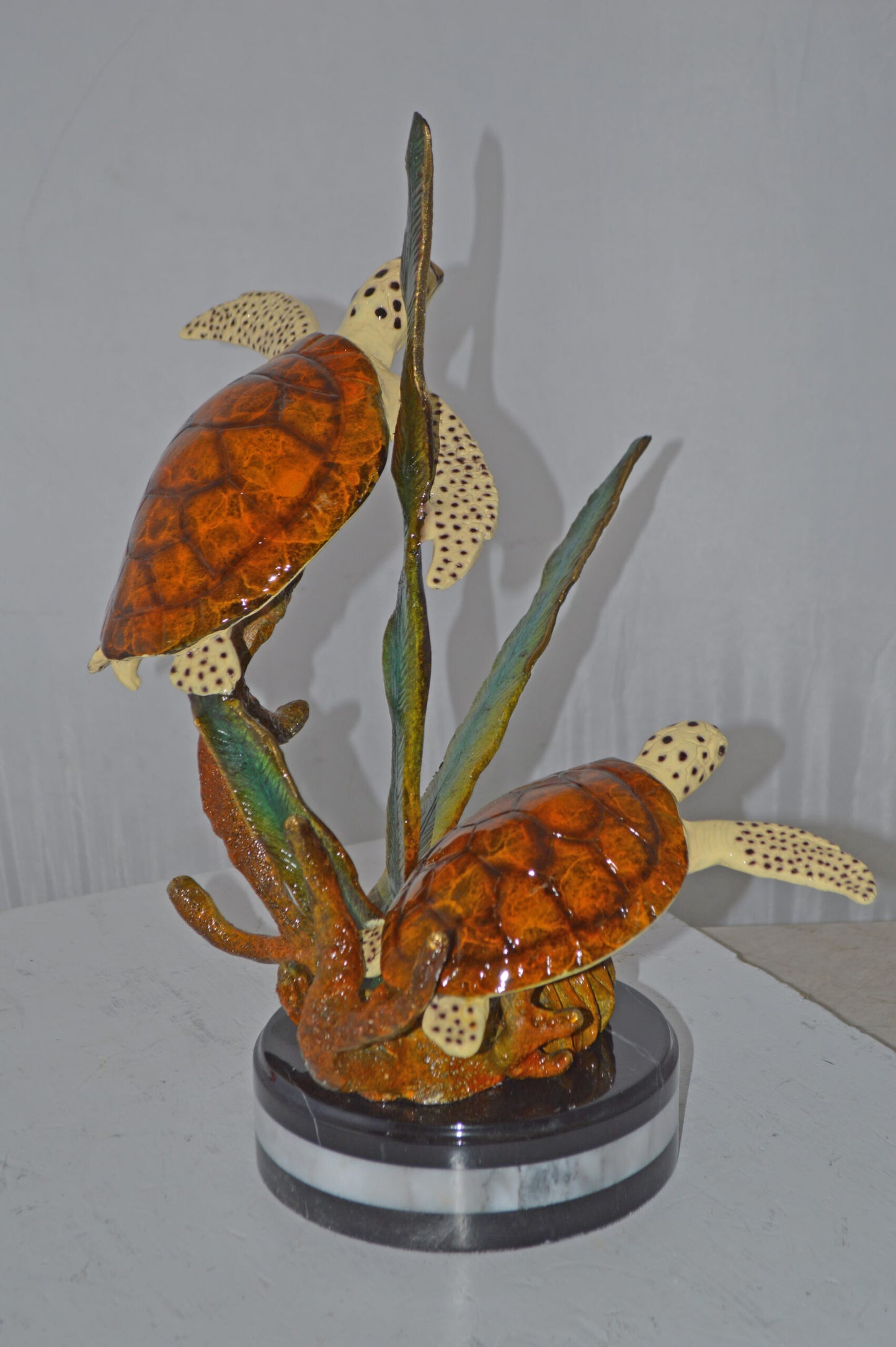 Two Brown Sea Turtles Swimming Bronze Statue - Size: 12"L x 16"W x 19"H.