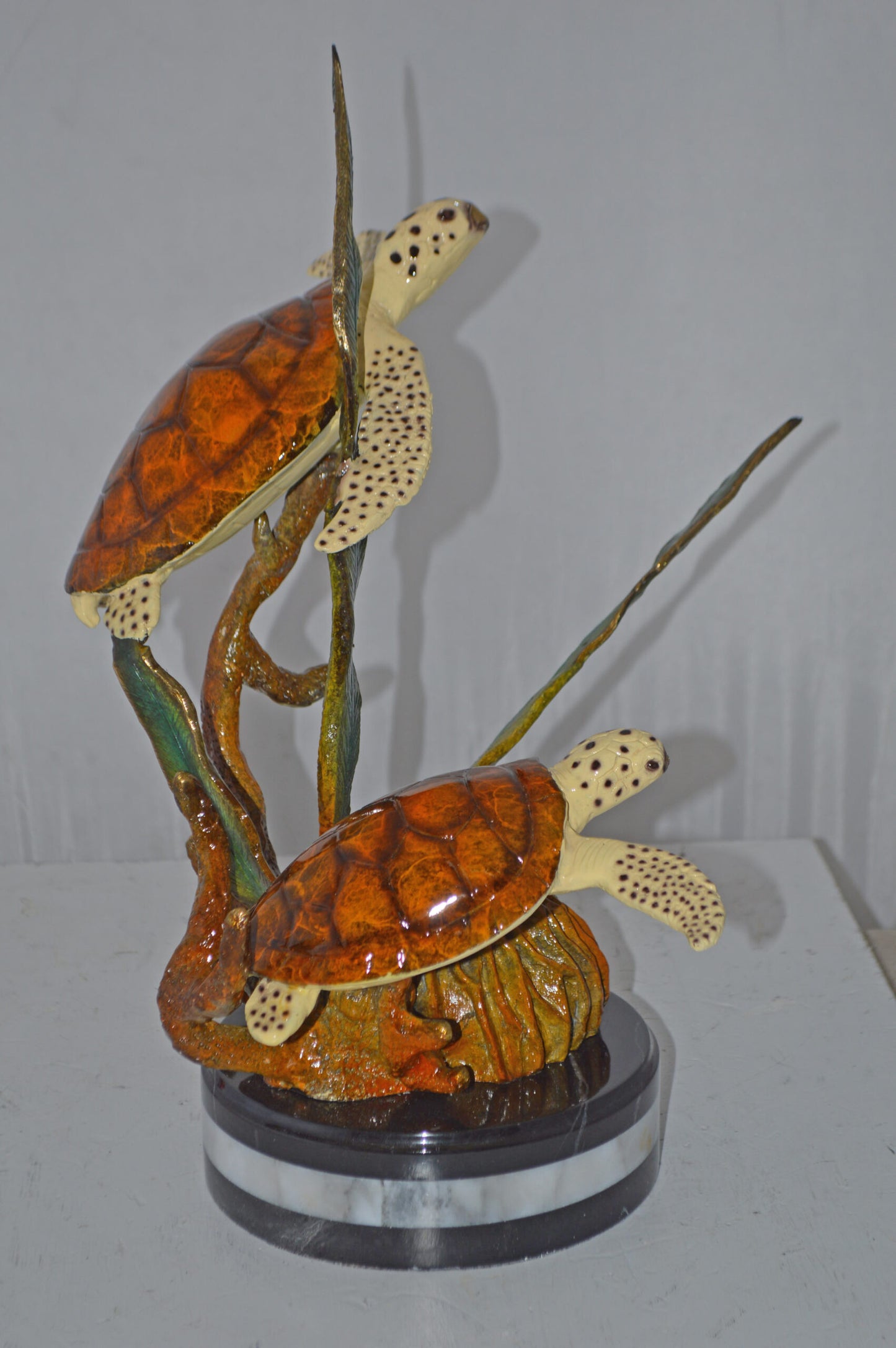 Two Brown Sea Turtles Swimming Bronze Statue - Size: 12"L x 16"W x 19"H.