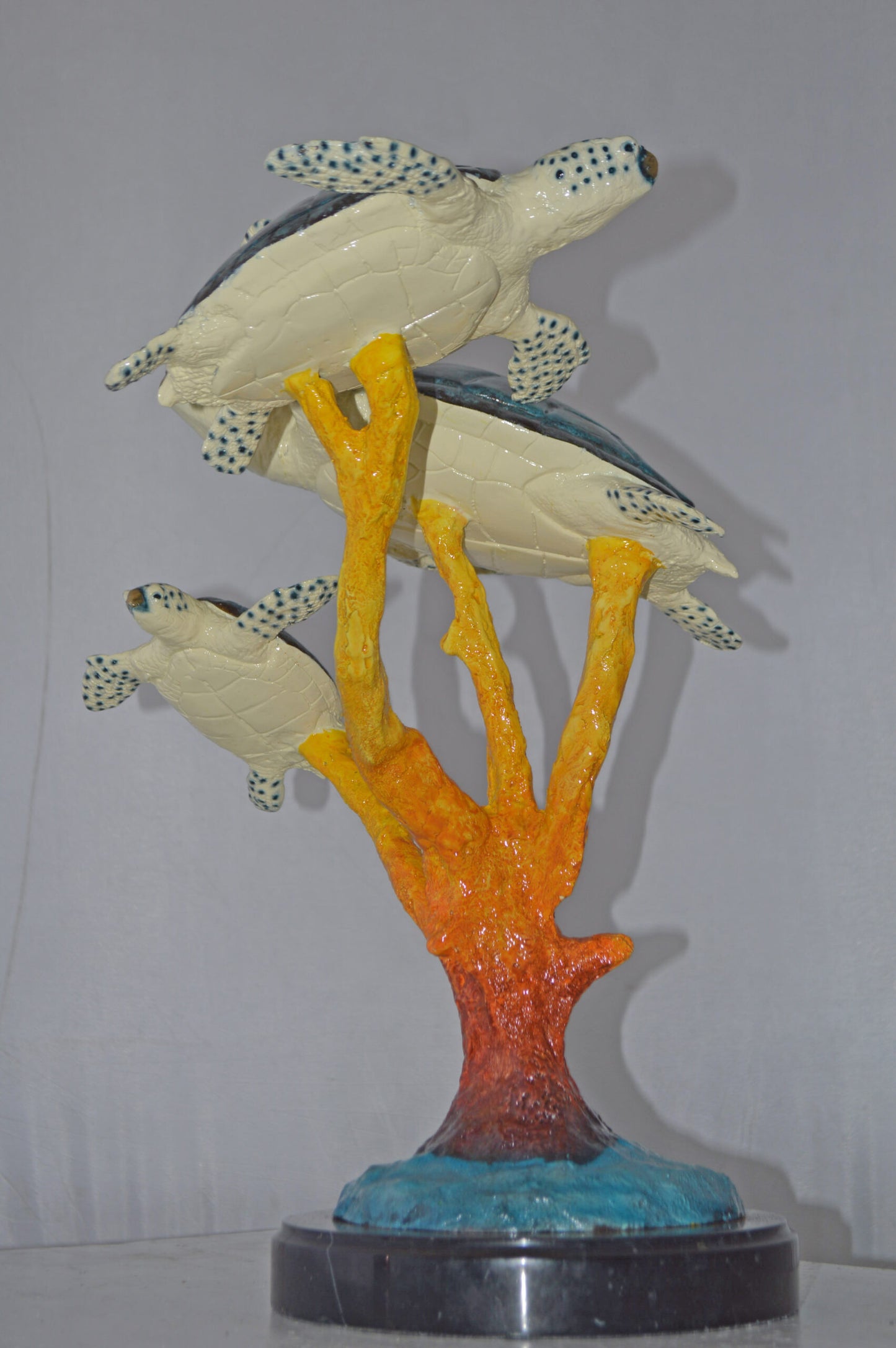 Three Turtles swimming around Corals Bronze Statue - Size: 17"L x 15"W x 19"H.
