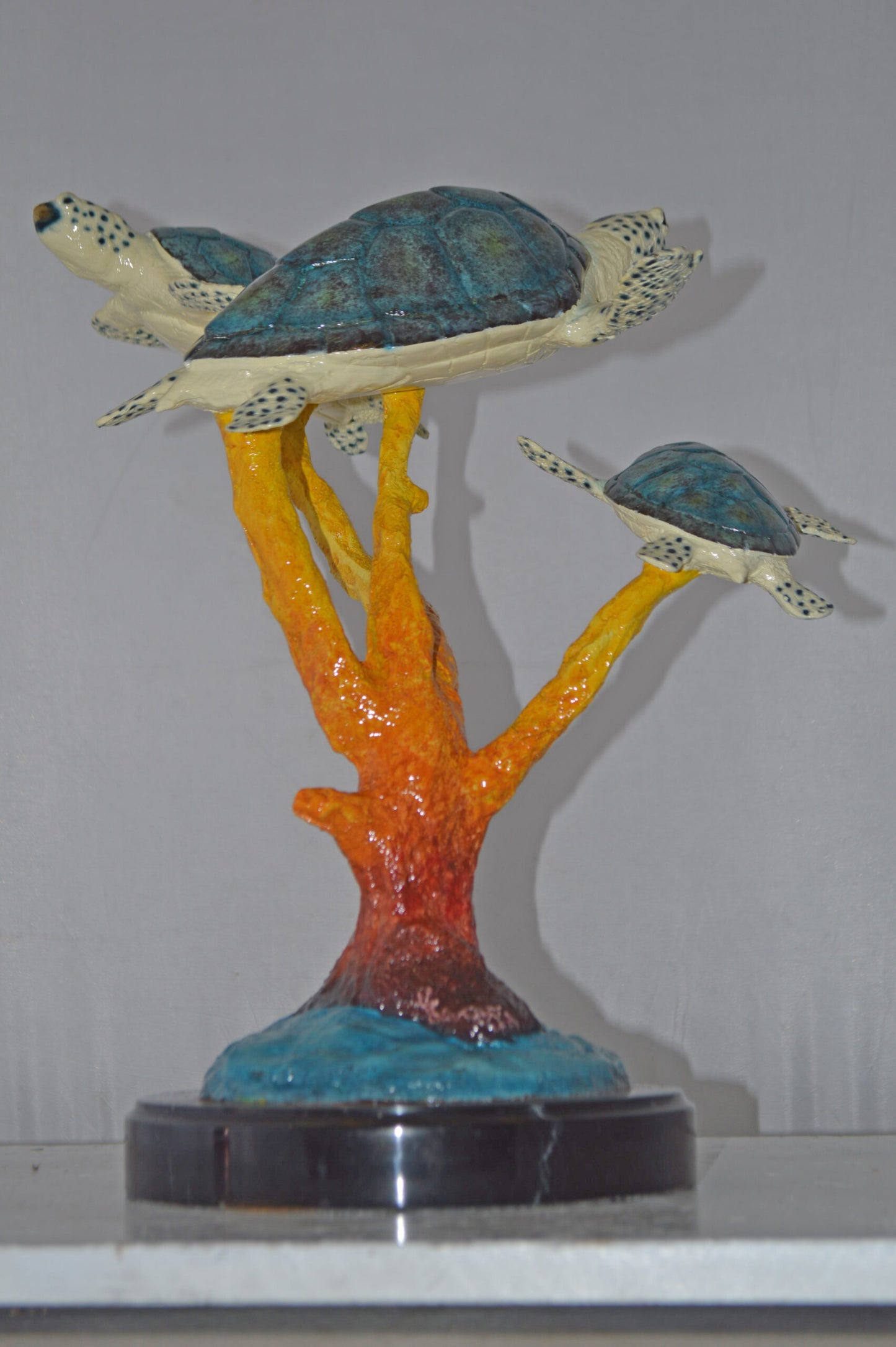 Three Turtles swimming around Corals Bronze Statue - Size: 17"L x 15"W x 19"H.