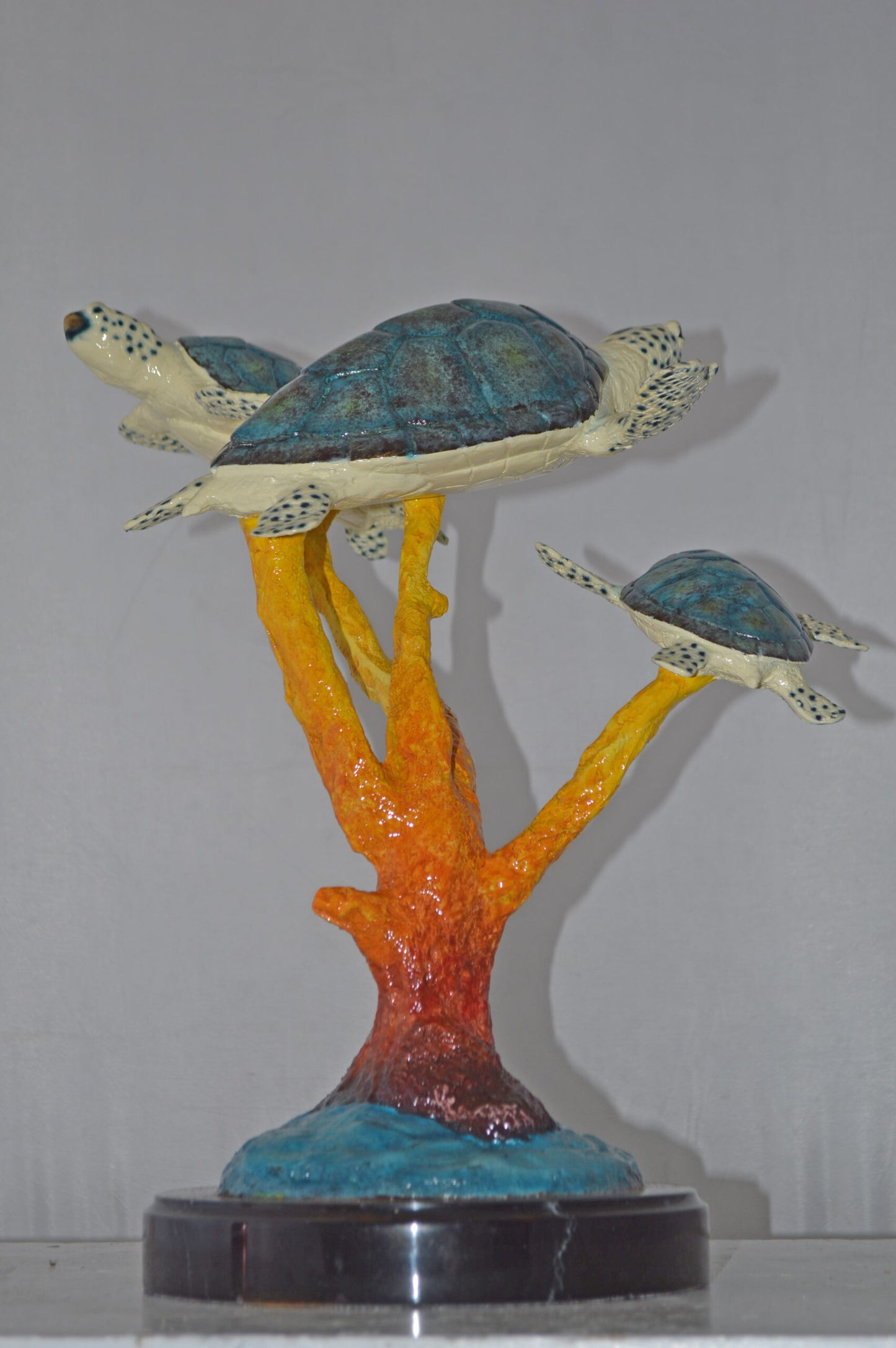 Three Turtles swimming around Corals Bronze Statue - Size: 17"L x 15"W x 19"H.