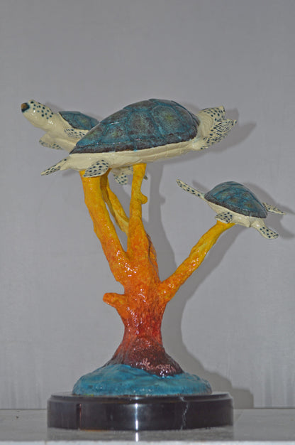 Three Turtles swimming around Corals Bronze Statue - Size: 17"L x 15"W x 19"H.
