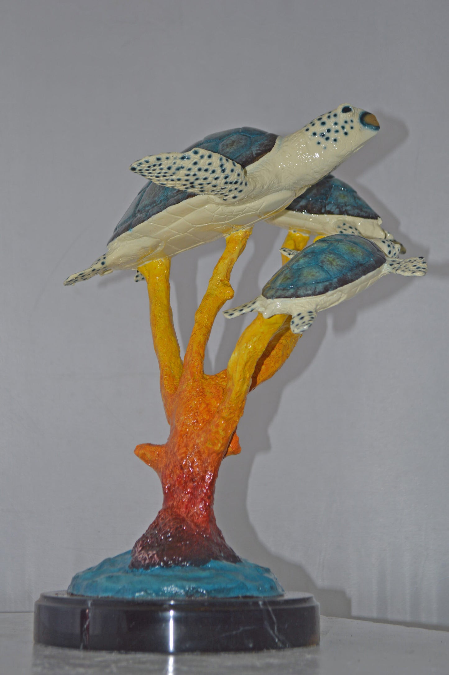 Three Turtles swimming around Corals Bronze Statue - Size: 17"L x 15"W x 19"H.