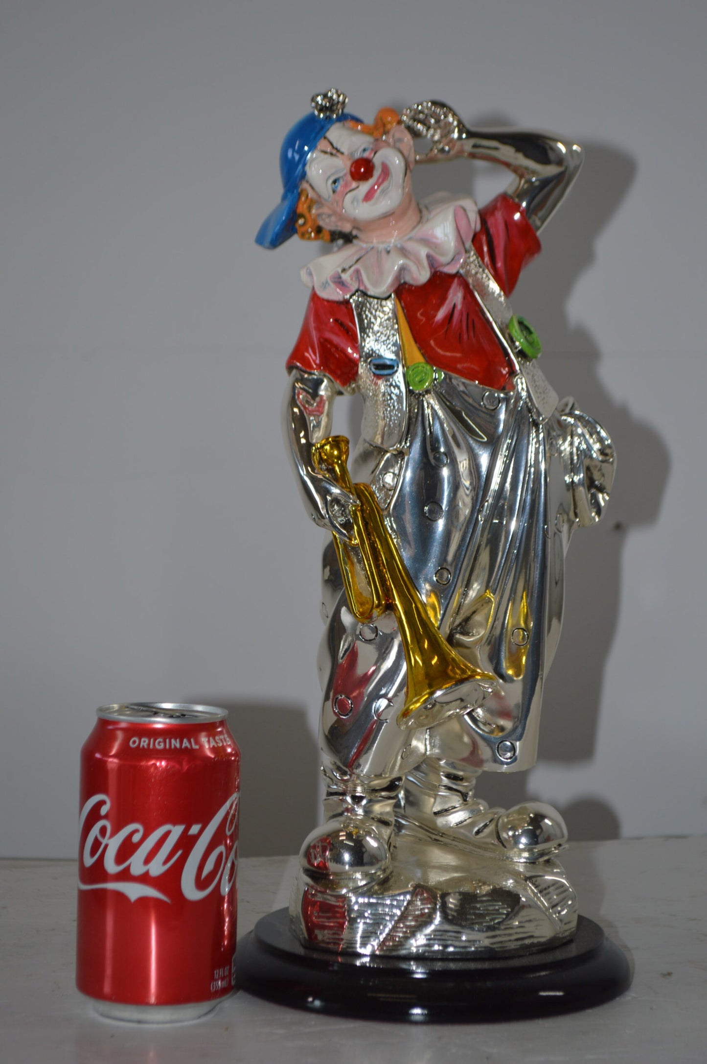 Clown plays Trumpet Resin Statue Silver finish - Size: 6"L x 6"W x 17"H.