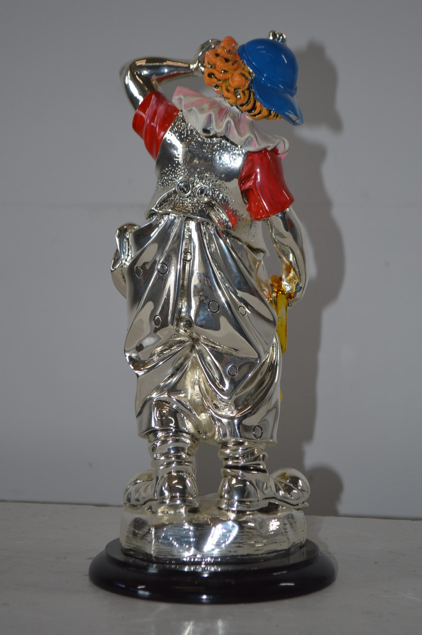 Clown plays Trumpet Resin Statue Silver finish - Size: 6"L x 6"W x 17"H.