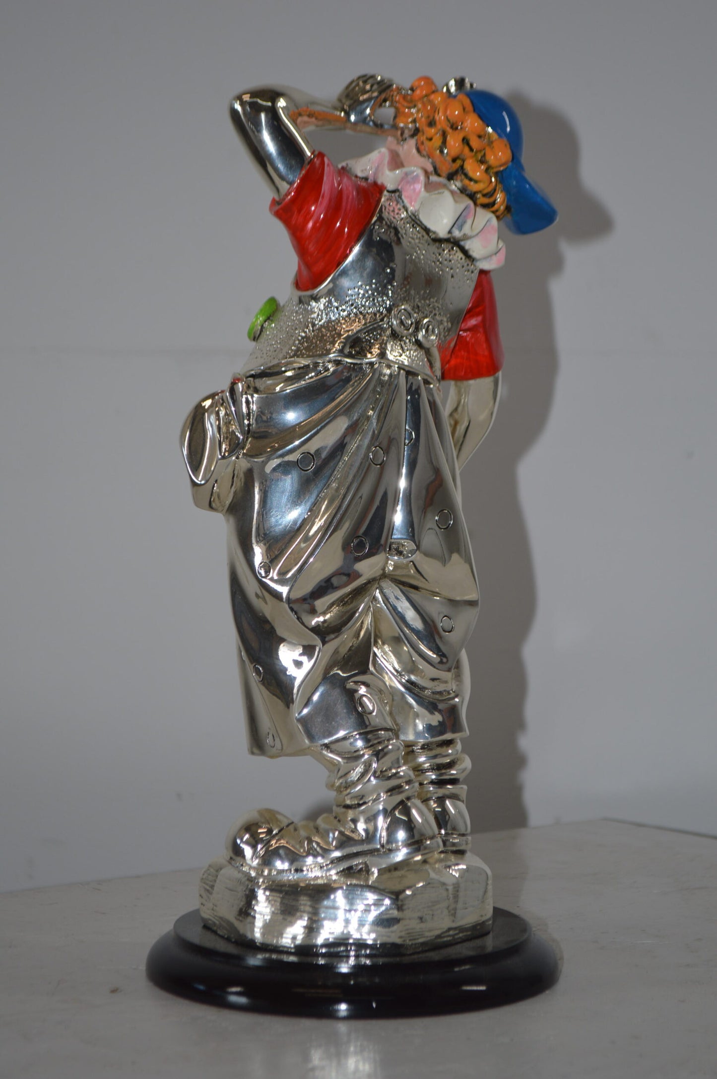 Clown plays Trumpet Resin Statue Silver finish - Size: 6"L x 6"W x 17"H.