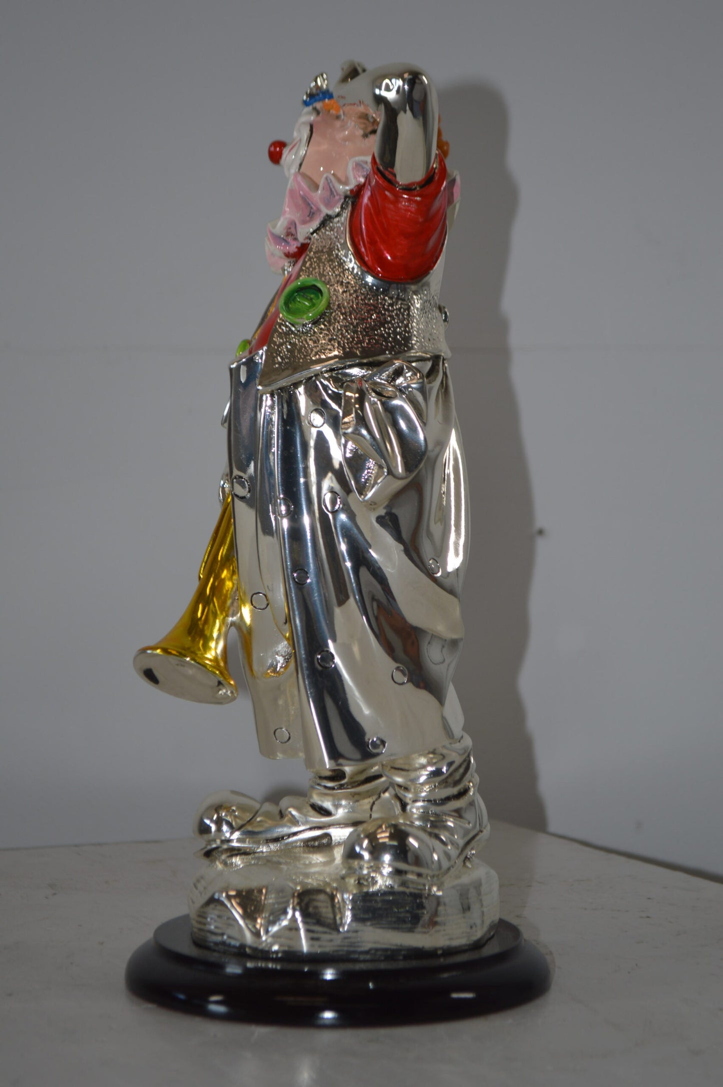 Clown plays Trumpet Resin Statue Silver finish - Size: 6"L x 6"W x 17"H.