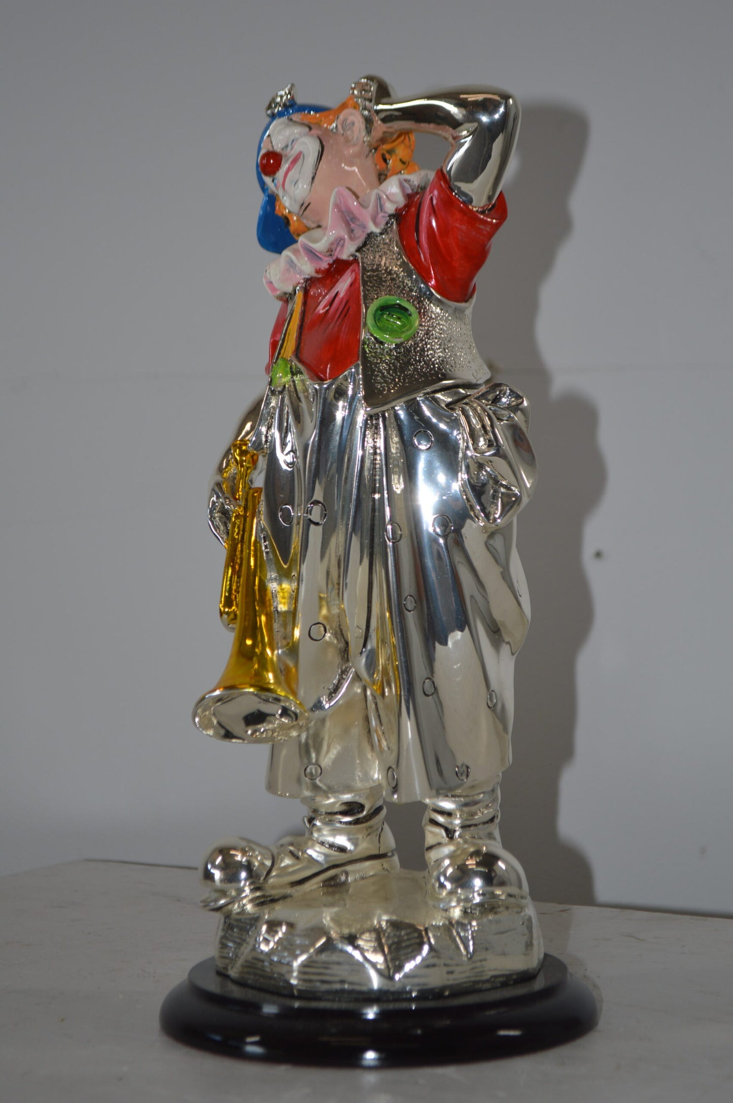 Clown plays Trumpet Resin Statue Silver finish - Size: 6"L x 6"W x 17"H.