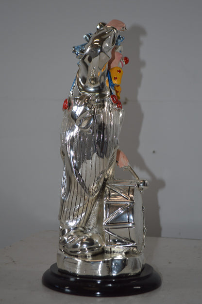 Clown Plays the Drams Resin Statue Silver finish - Size: 6"L x 6"W x 16"H.