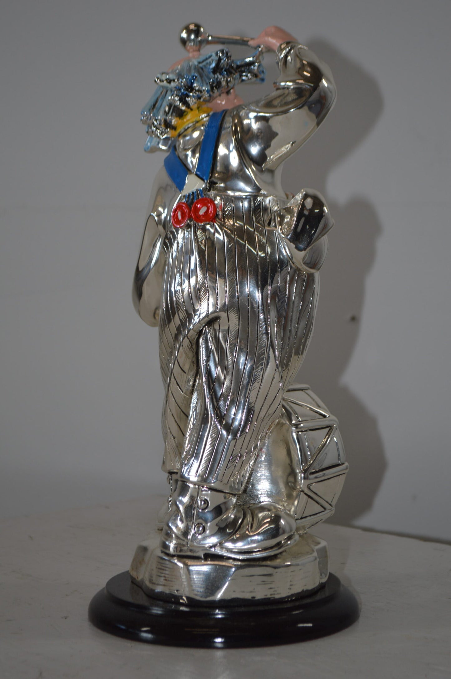 Clown Plays the Drams Resin Statue Silver finish - Size: 6"L x 6"W x 16"H.