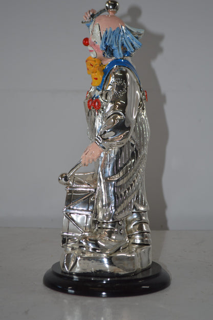 Clown Plays the Drams Resin Statue Silver finish - Size: 6"L x 6"W x 16"H.
