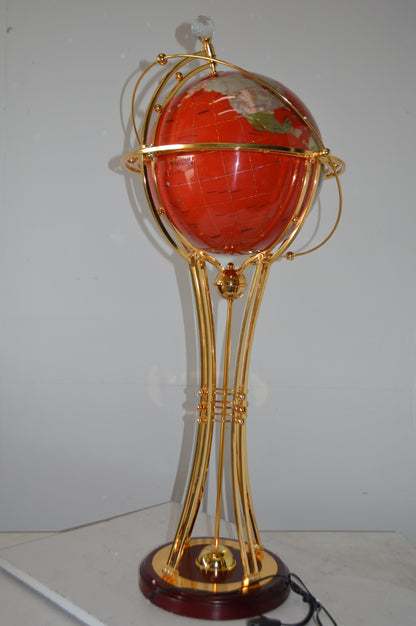 Illuminated Red - Gold World Globe Rotated by motor - Size: 19"L x 19"W x 42"H.