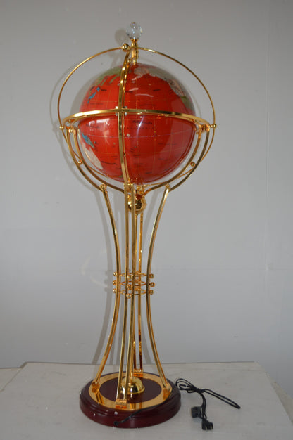 Illuminated Red - Gold World Globe Rotated by motor - Size: 19"L x 19"W x 42"H.