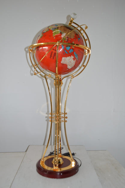 Illuminated Red - Gold World Globe Rotated by motor - Size: 19"L x 19"W x 42"H.