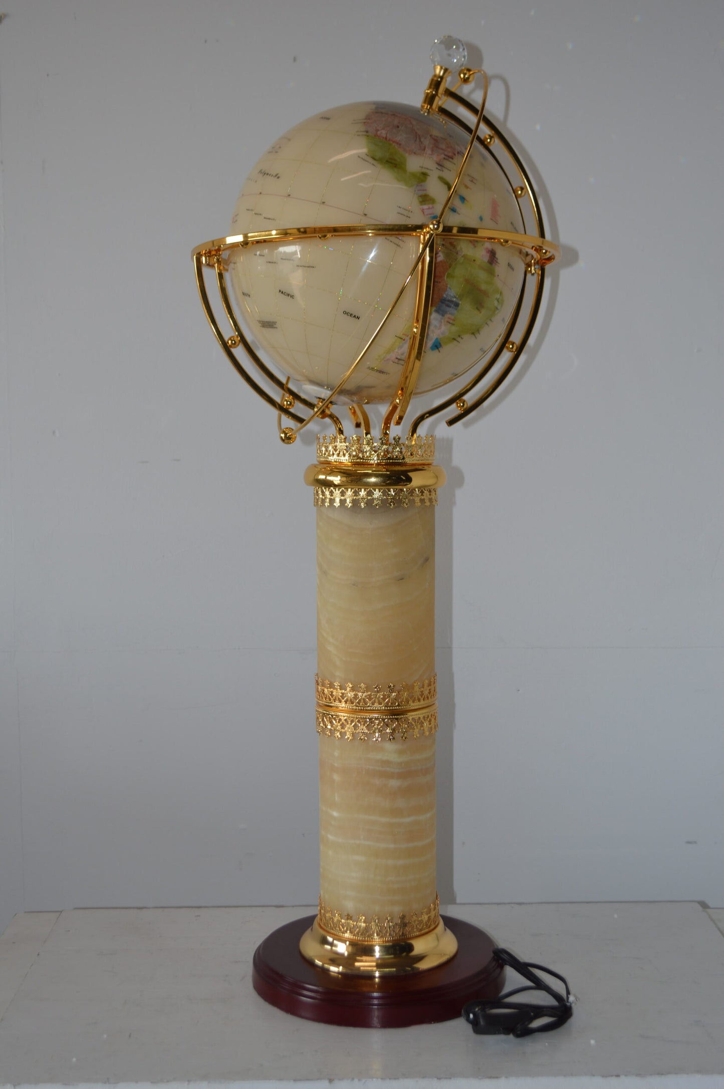 Illuminated White - World Globe Rotated by a Motor - Size: 19"L x 19"W x 42"H.