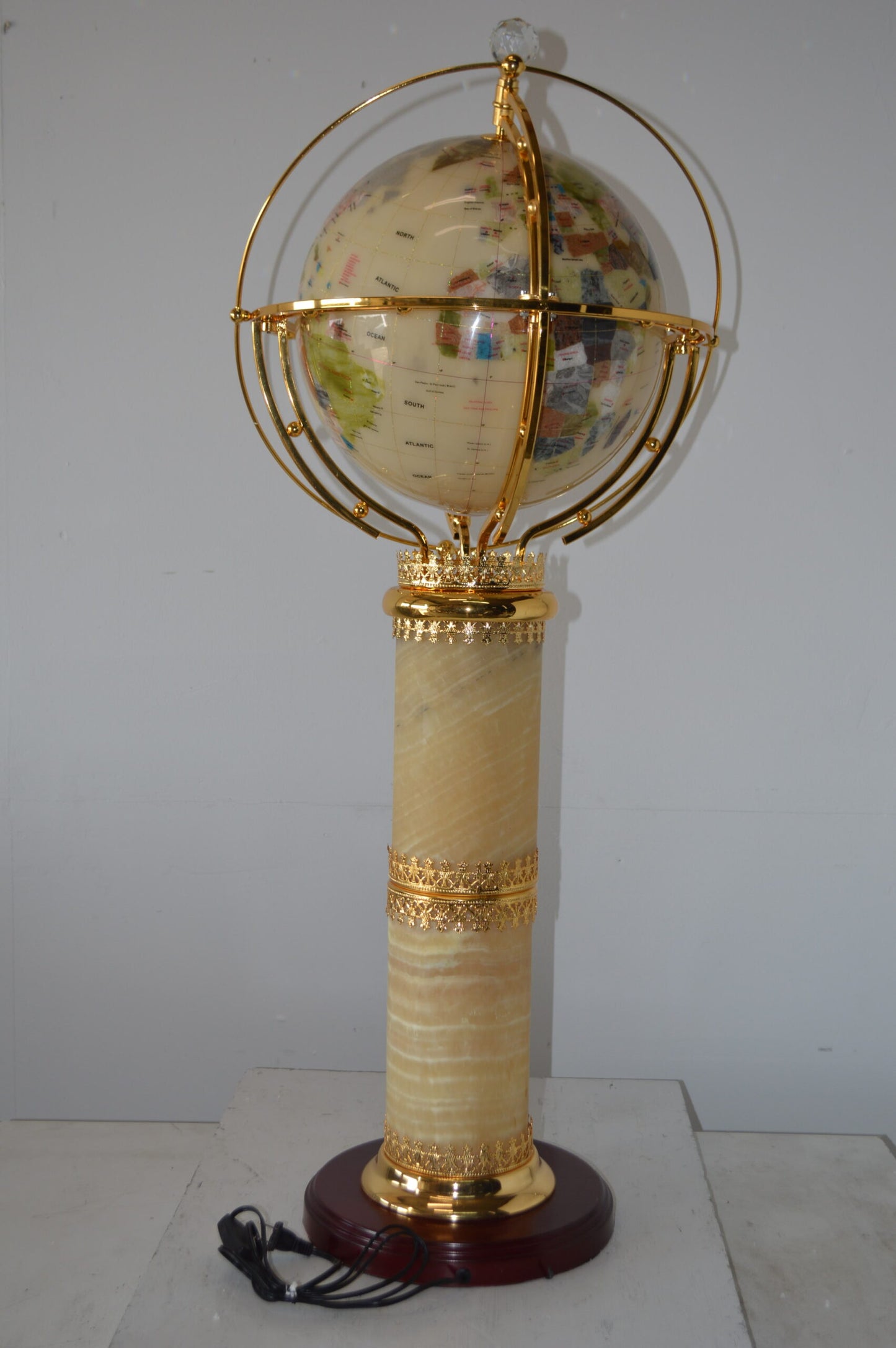 Illuminated White - World Globe Rotated by a Motor - Size: 19"L x 19"W x 42"H.