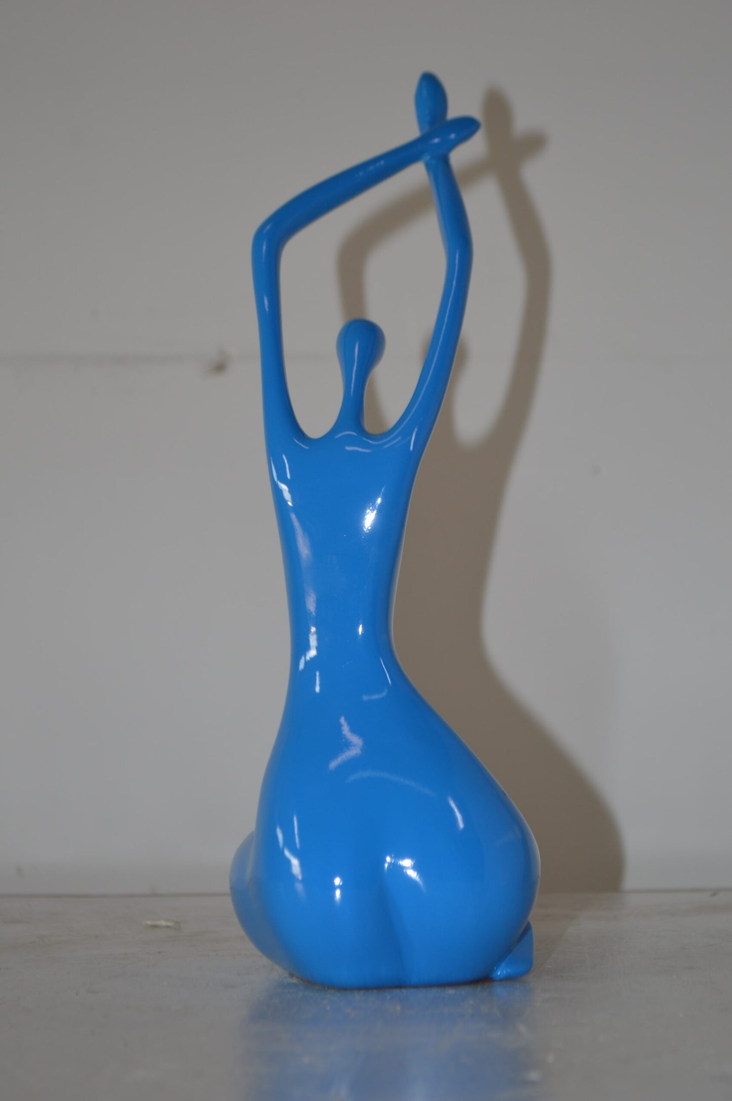 Modern Art Dancer in Action Blue Resin Statue - Size: 4"L x 6"W x 13"H.