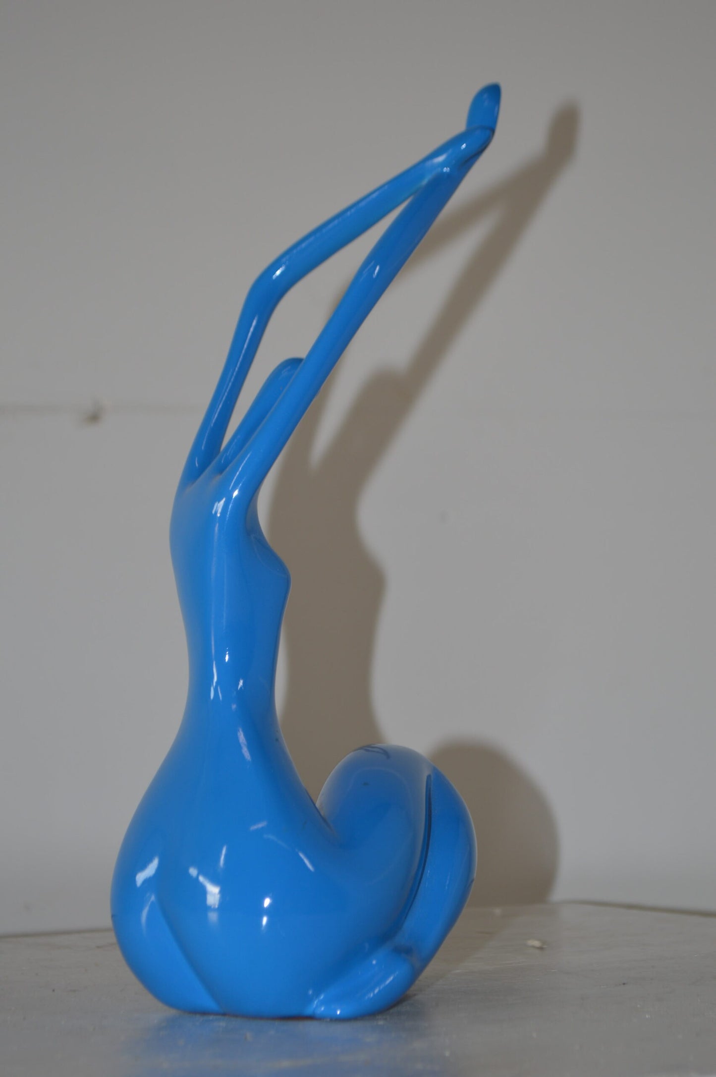 Modern Art Dancer in Action Blue Resin Statue - Size: 4"L x 6"W x 13"H.