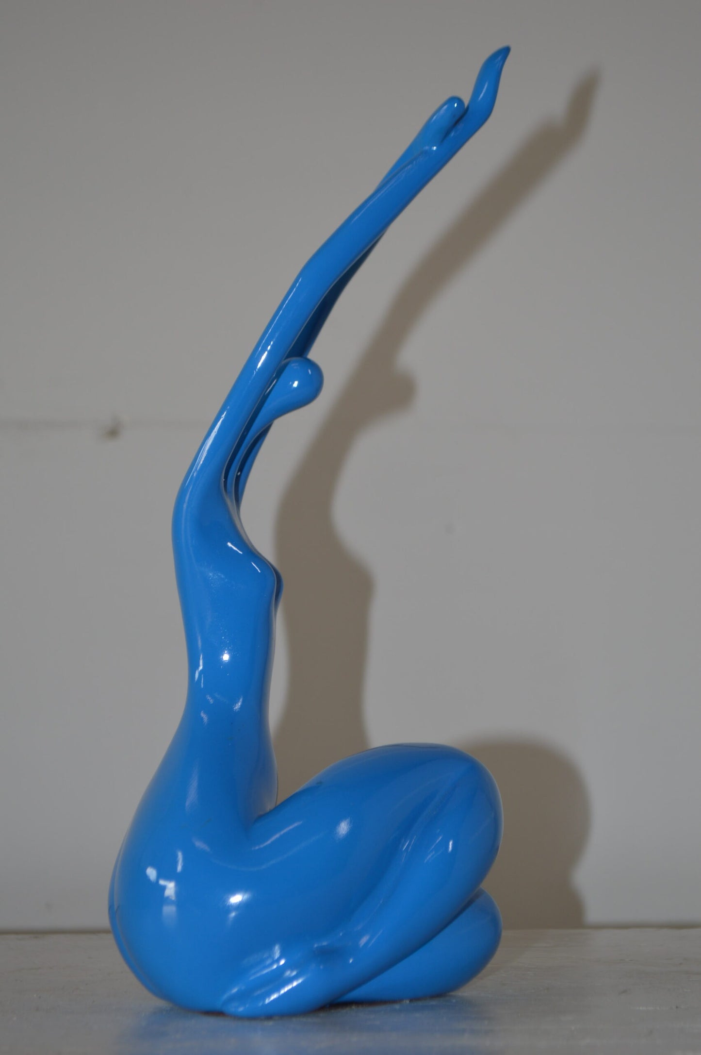 Modern Art Dancer in Action Blue Resin Statue - Size: 4"L x 6"W x 13"H.