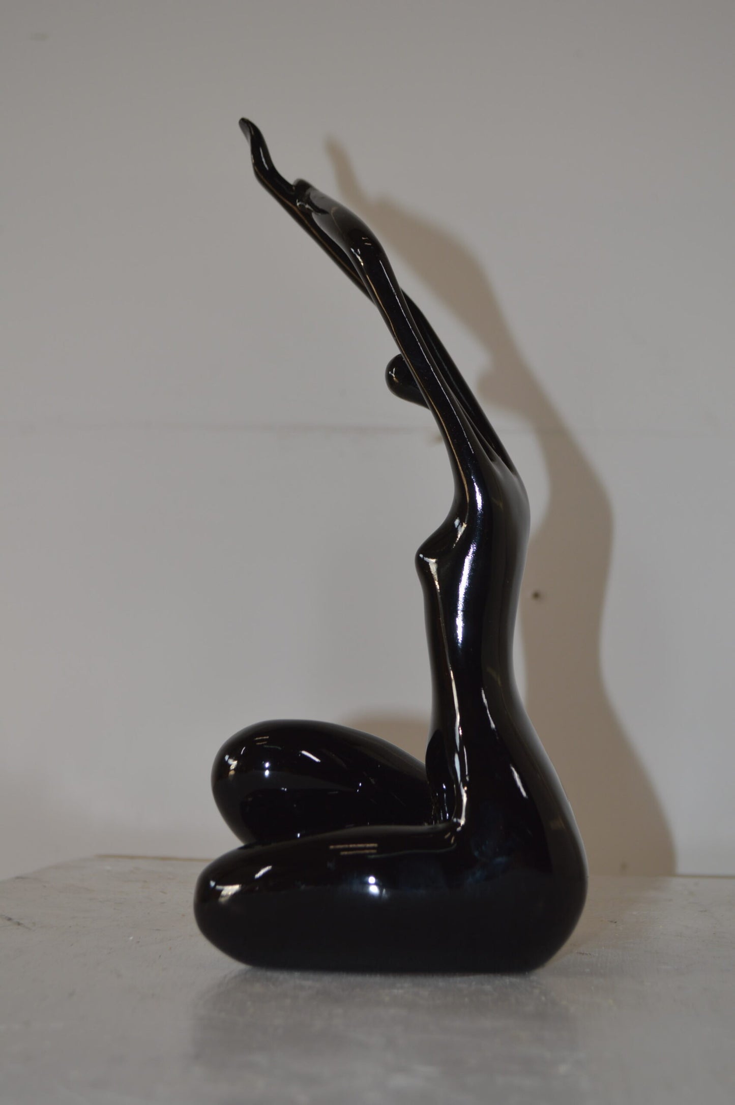 Modern Art Dancer in Action black Resin Statue - Size: 4"L x 6"W x 13"H.