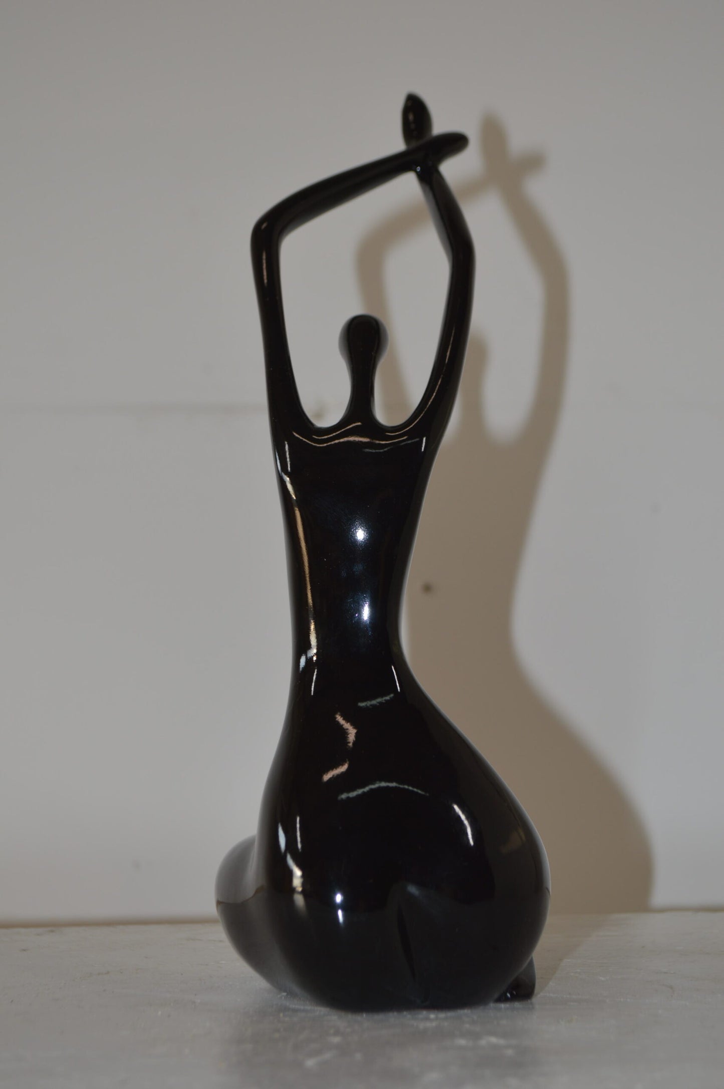 Modern Art Dancer in Action black Resin Statue - Size: 4"L x 6"W x 13"H.