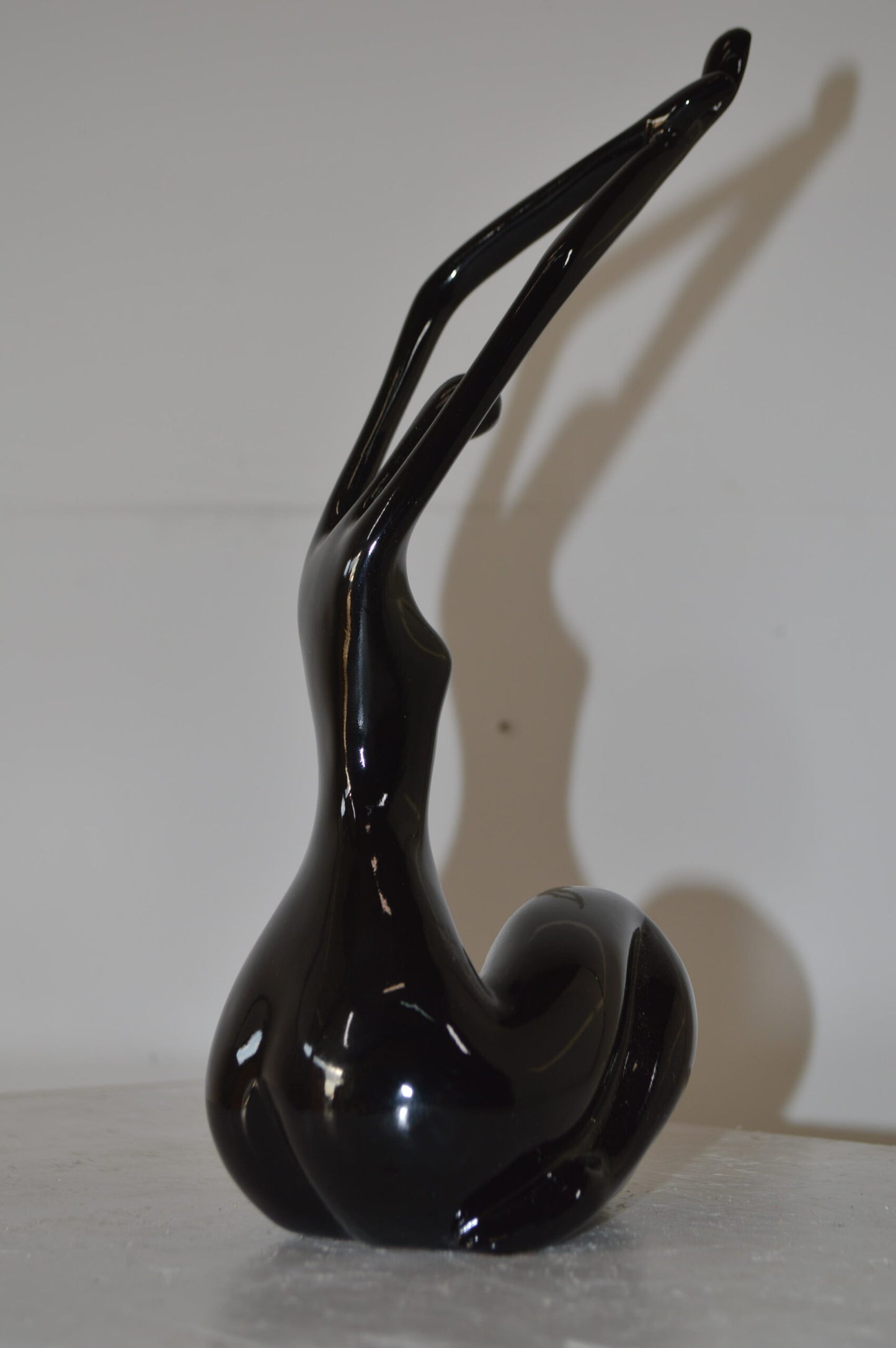 Modern Art Dancer in Action black Resin Statue - Size: 4"L x 6"W x 13"H.