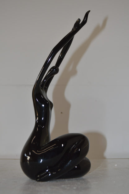Modern Art Dancer in Action black Resin Statue - Size: 4"L x 6"W x 13"H.