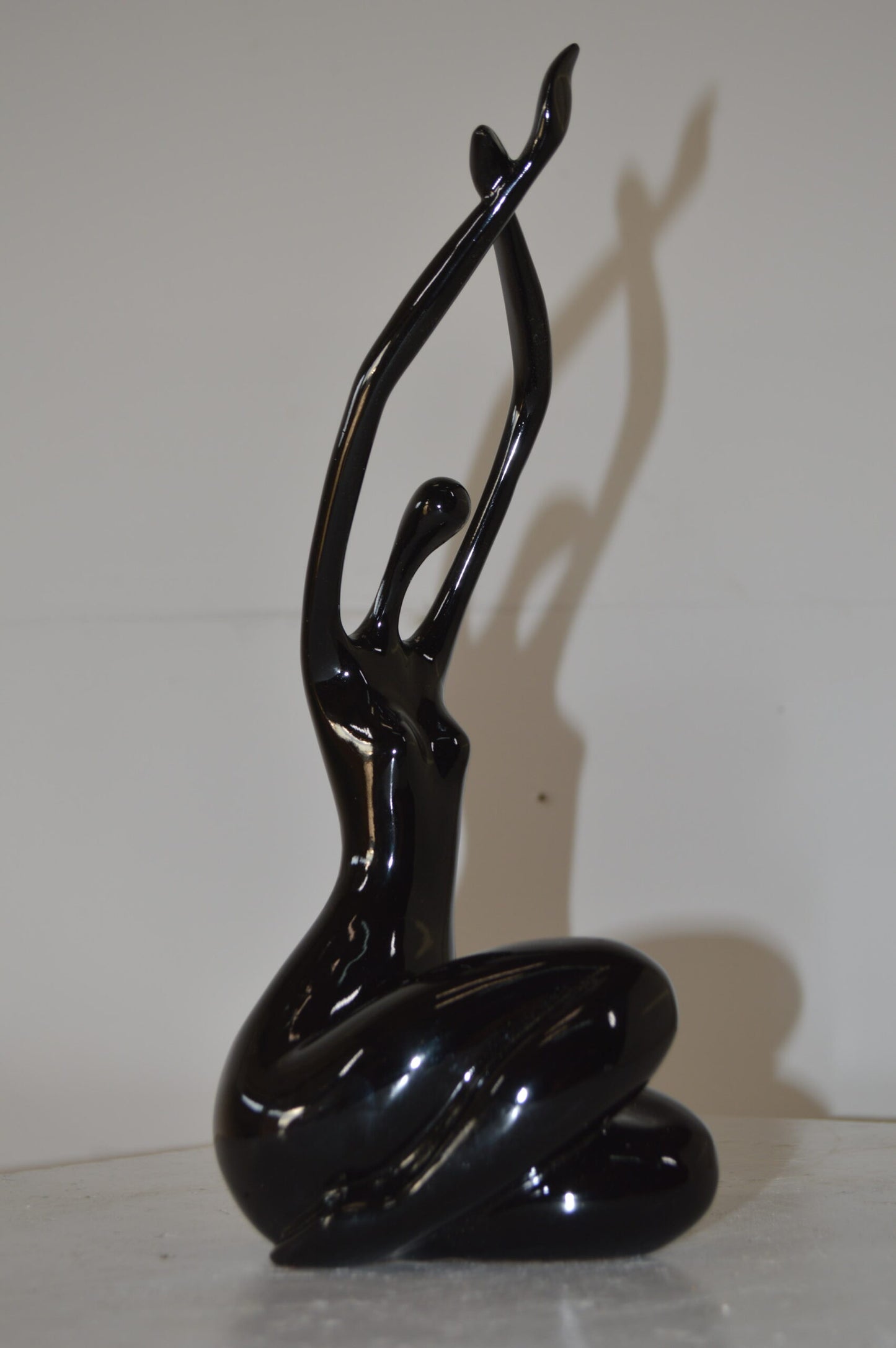 Modern Art Dancer in Action black Resin Statue - Size: 4"L x 6"W x 13"H.
