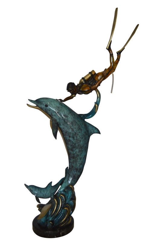 Diver With Dolphin Bronze Statue -  Size: 10"L x 30"W x 49"H. 