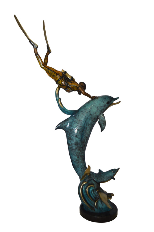 Diver With Dolphin Bronze Statue -  Size: 10"L x 30"W x 49"H. 
