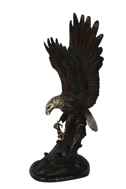 Eagle perched bronze statue -  Size: 28"L x 18"W x 41"H.