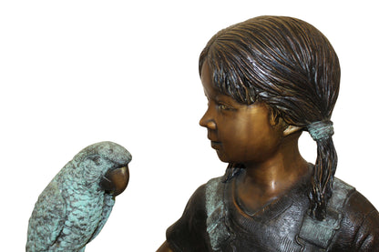 Girl Holding a Parrot Bronze Statue -  Size: 26"L x 19"W x 42"H. 