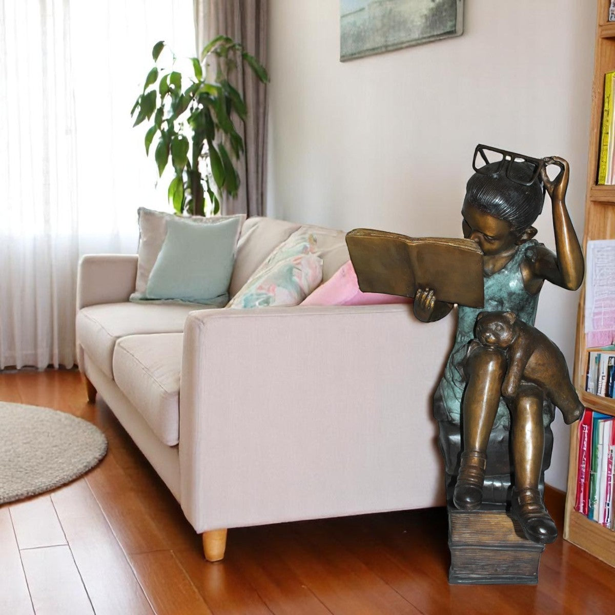 Girl sitting on a stack of books reading a book Bronze Statue -  17"x 18"x 36"H