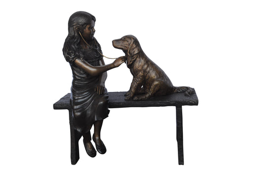 Girl plays Doctor on a Bench W Dog Bronze Statue -  Size: 38"L x 18"W x 39"H.