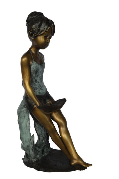 Girl sitting and reading a book bronze statue -  Size: 19"L x 15"W x 36"H.